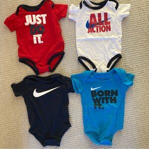 Nike 3-6mo onesies. Set of 4